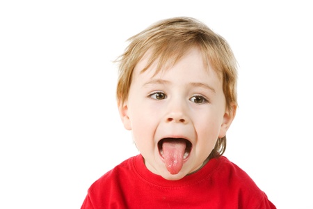 Small boy with  pulling funny face の写真素材