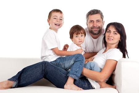 Young parents with children at home.の写真素材