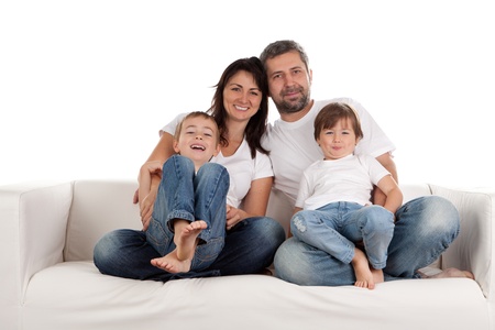 Young parents with children at home.の写真素材