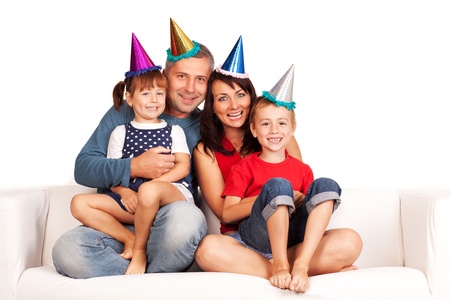 Happy family . Father, mother and children celebrating birthday at homeの写真素材