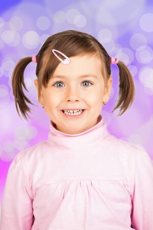 Pretty little girl smiling.の写真素材