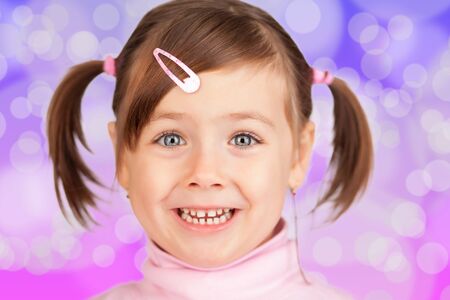 Pretty little girl smiling.の写真素材
