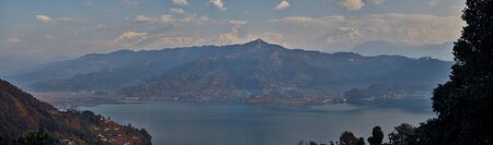 Morning view of Pokhara and Phewa lake with Himalaya mountains at the background from World Peace Pagoda in Pokhara, Nepal.の写真素材