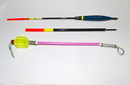 top view on fishing tackles with white backgroundの写真素材