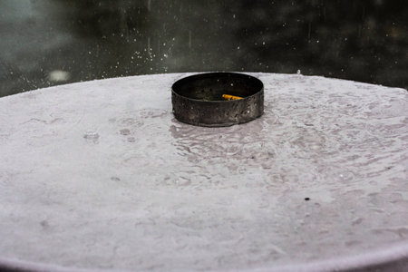 Summer rain and a cigaretの写真素材