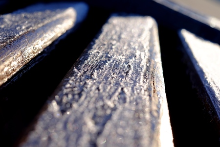 Hoarfrost on a bench background, wooden cold frost frozen,の写真素材