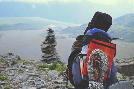 Tourist with backpack with a mountain view, extremeの写真素材