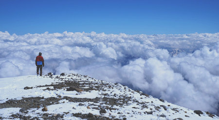 Man on top of mountain peak, new, travel, sky