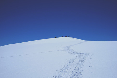Hikers on a mountain top landscape, climberの写真素材