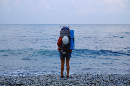 Girl on the beach with a backpack young, vacation hipster, girl, travel