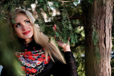 Beautiful girl in the coniferous forest portrait, people female, womanの写真素材