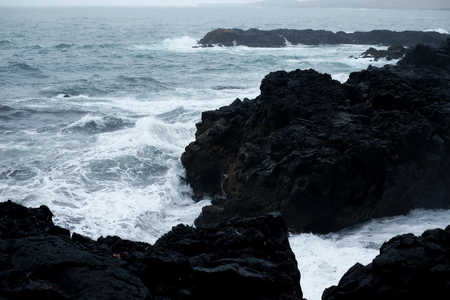 Stormy Ocean in Iceland rock, wave, stormy stormの写真素材