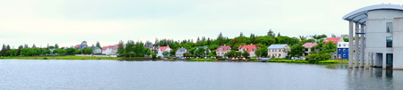 Panorama of Reykjavik lake, winter, town tjornin cityの写真素材