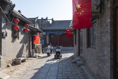 National Day of 2019 National Day Qingzhou Ancient City Tourism Scenic Area, Shandong Province, Hanging Five-Star Red Flag to Celebrate National Dayのeditorial素材
