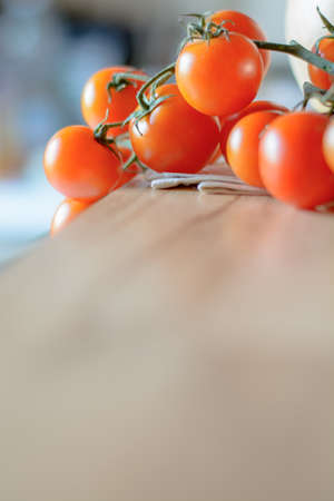 Red tomatoes on wooden topの写真素材