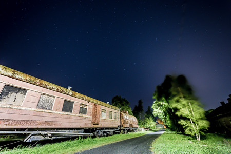 Rusty old train car with some stars in the skyの写真素材