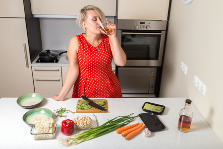 Cooking can wait if you need to drink some whiskeyの写真素材