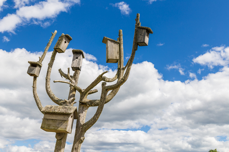 Heap of boxes for birds to nest in them in summerの写真素材