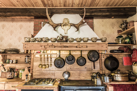 Rustic style kitchen with pots and pansの写真素材