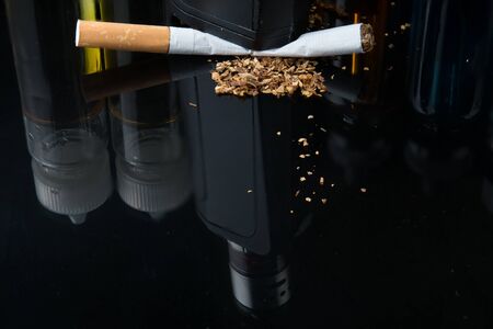 Modern vaporiser versus old tobacco cigaretteの写真素材