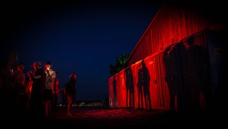 Toilet que with red shadowsの写真素材