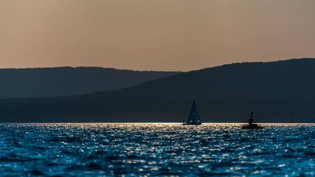 Beautiful sunset over the Balaton Lake in Hungary, Europe on a summer day.の写真素材