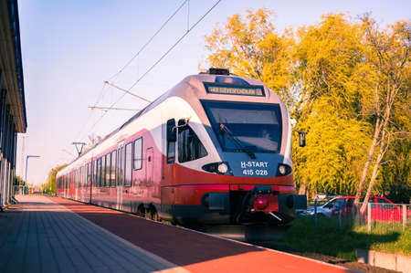 VELENCE, HUNGARY - APRIL 25, 2021: View on a Hungarian State Railways train arriving to the station of Agard, Hungary.のeditorial素材