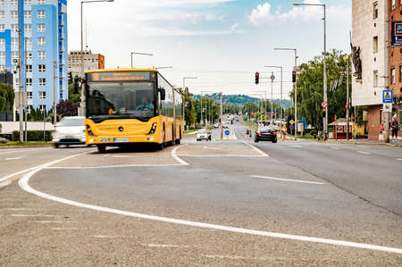 ZALAEGERSZEG, HUNGARY - AUGUST 15, 2021: View on the traffic and people in Zalaegerszeg on the Kazinczy square square and Lake Balaton way on a cloudy summer day.のeditorial素材