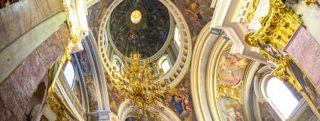 LJUBLJANA, SLOVENIA - FEBRUARY 15, 2022: Interior of the Saint Nicholas Cathedral of Ljubljana,...