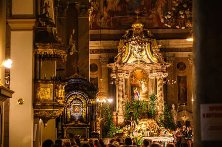 LJUBLJANA, SLOVENIA - FEBRUARY 15, 2022: Interior of the Franciscan Church of the Annunciation in Ljubljana during a mass ceremonyのeditorial素材