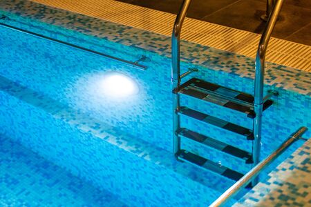 Swimming pool for luxury lifestyle design. Water - swimming pool. Luxury lifestyle. Natural pattern, luxury. Blue background. Water sports. Water - swimming pool.の写真素材