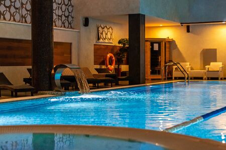 Swimming pool for luxury lifestyle design. Water - swimming pool. Luxury lifestyle. Natural pattern, luxury. Blue background. Water sports. Water - swimming pool.の写真素材