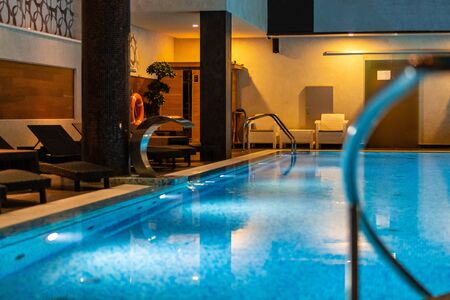 Modern blue on light backdrop. Water - swimming pool. Trendy design.の写真素材