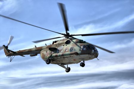 Military helicopter in sky