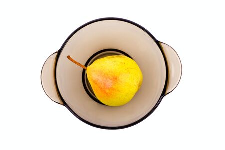 Pear in bowl on isolated white backgroundの写真素材