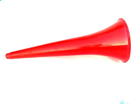 blank vuvuzela stadium plastic horn. fan vuvuzela trumpet isolated on white backgroundの写真素材