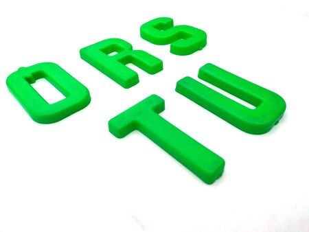 alphabet plastic capital letters isolated on  white backgroundの写真素材