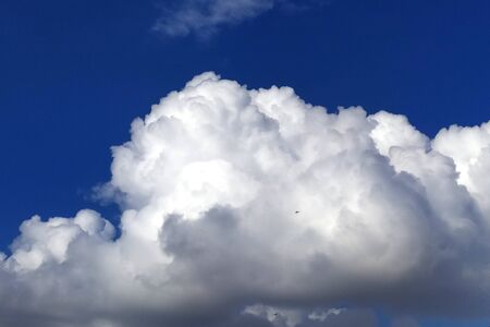 rainy clouds flying in the blue sky