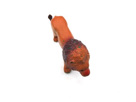 a plastic lion toy isolated on white backgroundの写真素材