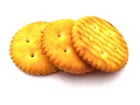 Stack of sweet meal digestive biscuits isolated on white