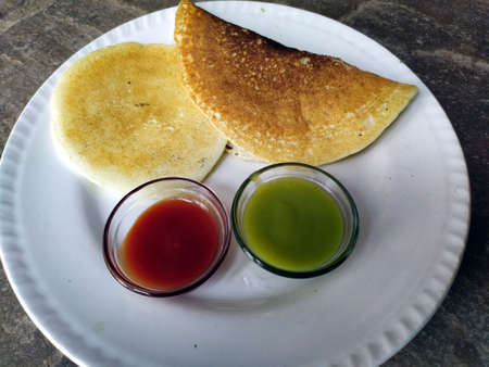 fresh healthy eatable food with chutney put in plate