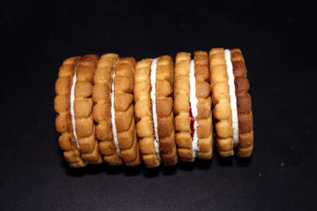 Stack of sweetmeal digestive biscuits isolated on white backgroundの写真素材