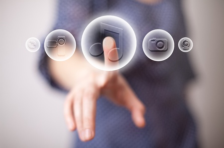 woman hand pressing music buttonの写真素材