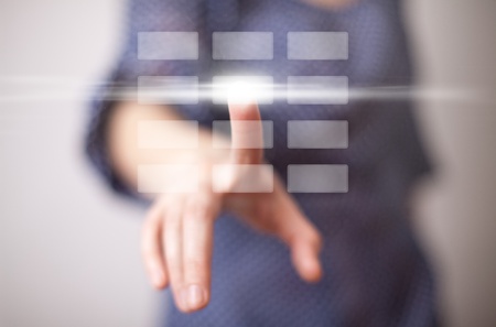 woman hand pressing digital button