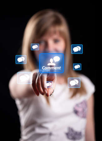 Woman hand pressing Comment button, backround in bokehの写真素材
