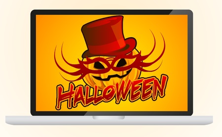 Halloween masked pumpkin in modern laptop の写真素材
