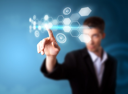 A businessman working on modern technology, selective focusの写真素材