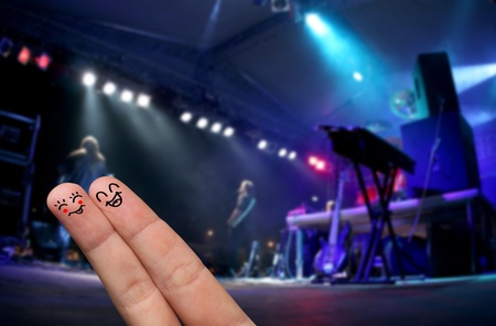 Happy Finger Hug at an open-air live concert の写真素材