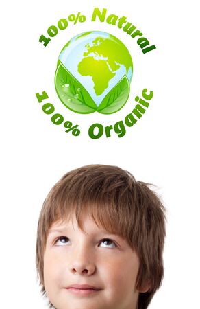 Young persons head looking at green eco signの写真素材