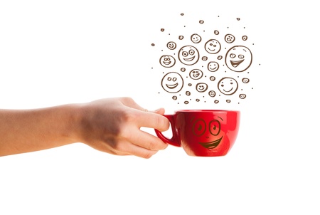 Coffee-cup with brown hand drawn happy smiley faces, isolated on whiteの写真素材